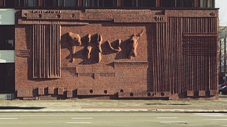 Henry Moore, Wall Relief No.1 (1955)
Rotterdam

Commissioned by the Bouwcentrum 
Henry Moore is best known for his abstract sculptures of figures, recognizable for their undulating lines and large, unusual proportions. Wall Relief No. 1 deviates from