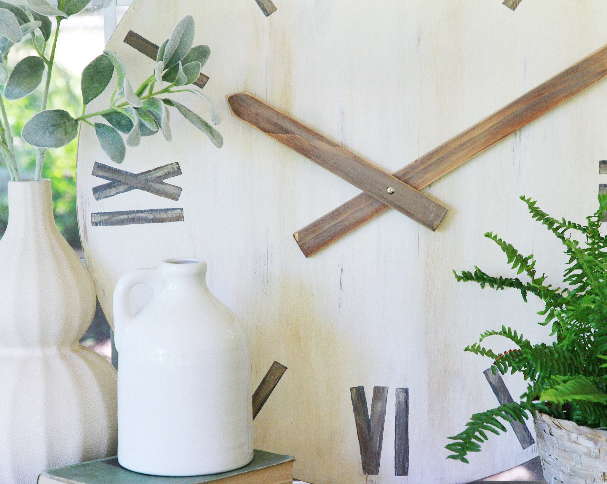 An old thrifted table top transformed into a decorative clock