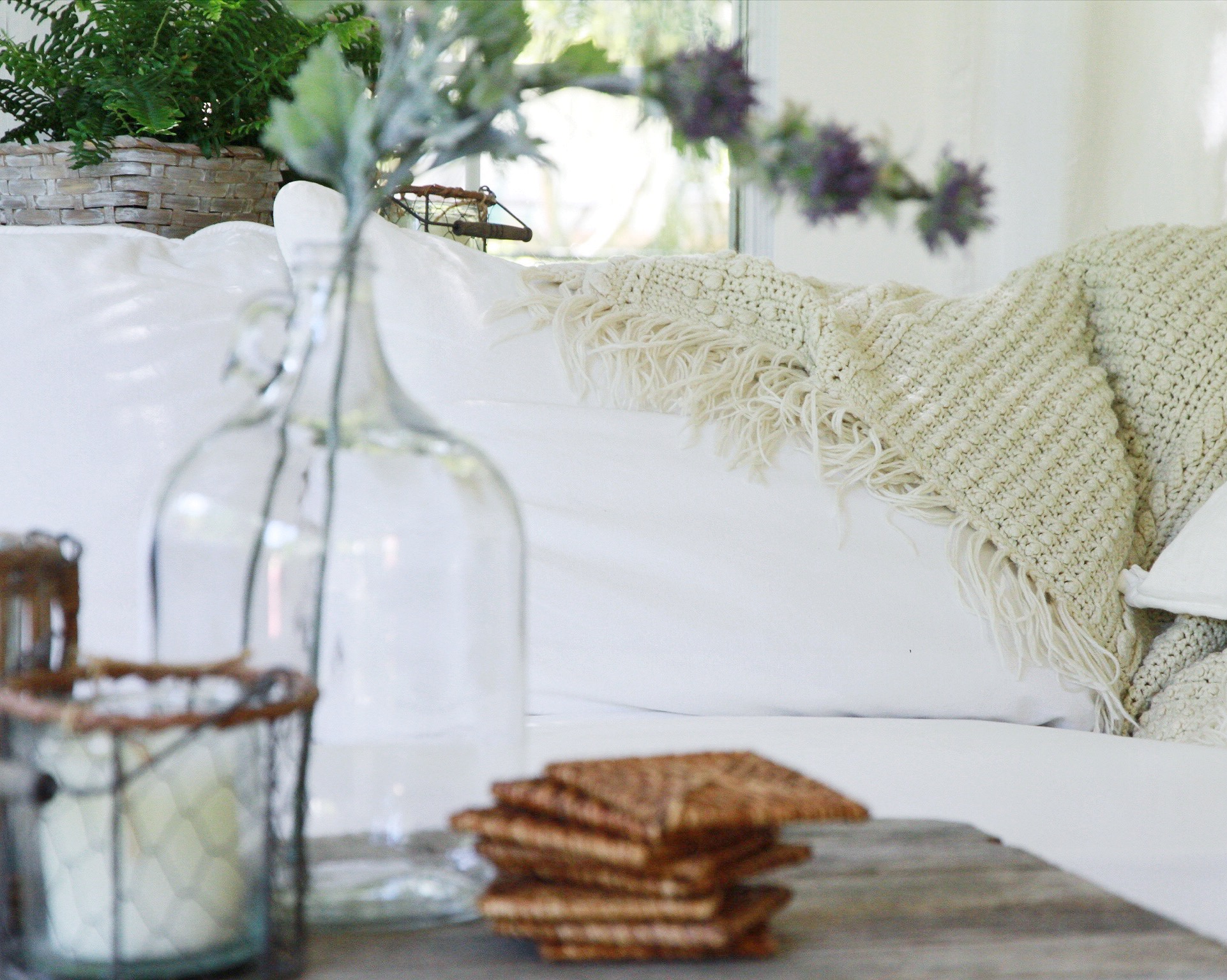 Here are blankets, vases and dishes that have been found while thrifting