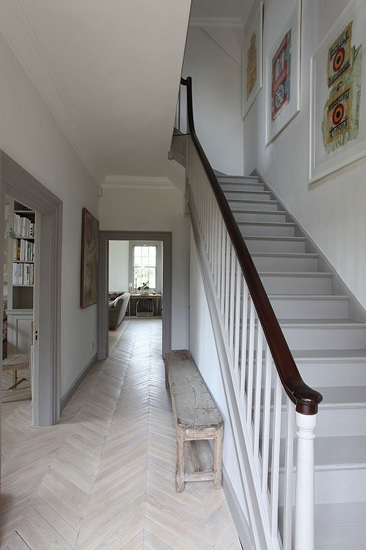 painted-gray-trim-herringbone-light-floors