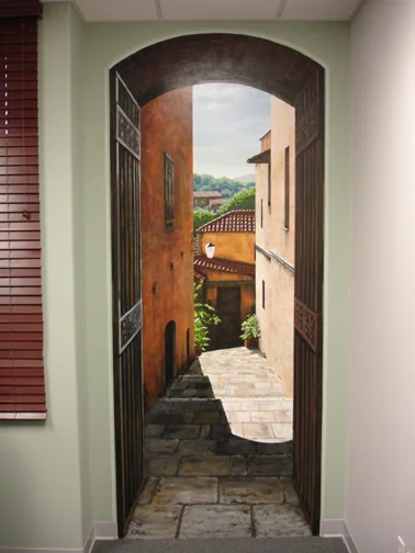 tucson artist joe pagac paints a mural of sicily1.jpg