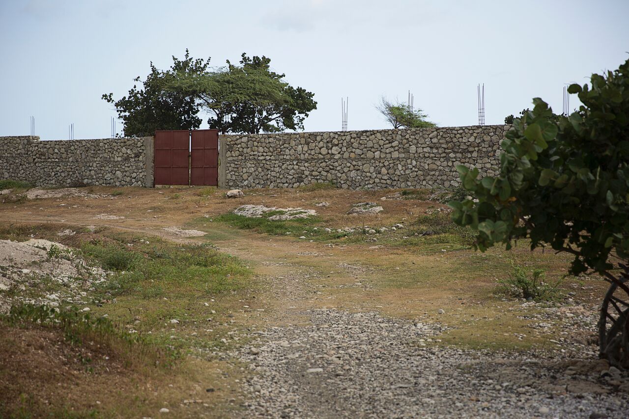 The security wall will guard our land as we begin construction and wrap around our future safe house, providing safety to the beautiful women who will call Nadege their "home".