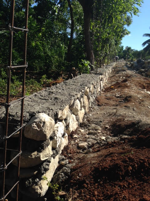 The security wall around our property will keep our land safe as we build the safe house, and then it will keep the women and children who live there secure.