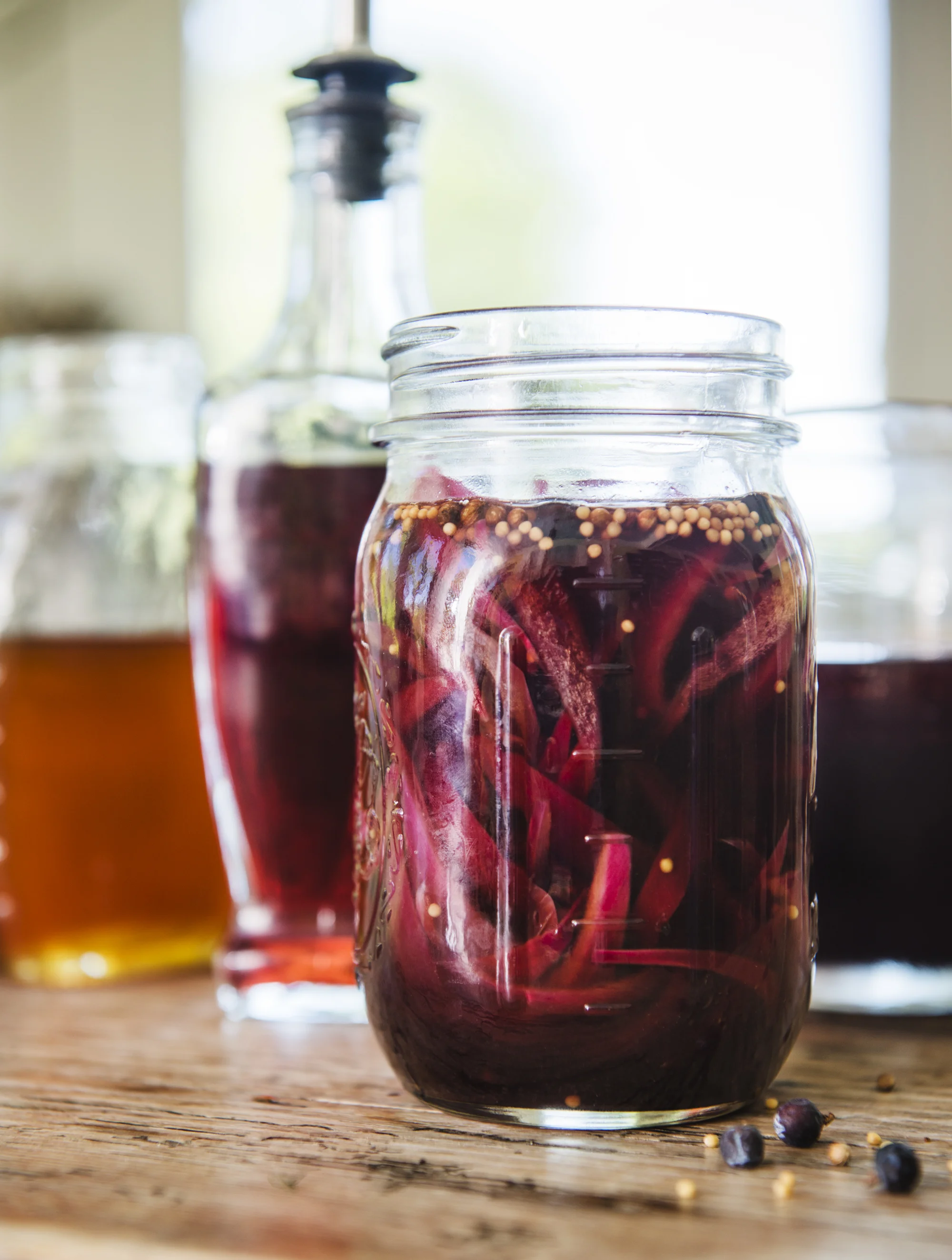 Pickled Red Onions Ingredients · 2 Small red onions, sliced into thin crescents · 1 Cup of pomegranate juice · ½ Cup of red wine vinegar · ¼ Cup of honey · ½ Teaspoon yellow mustard seeds · ½ Teaspoon coriander seeds · ¼ Teaspoon sea salt · 4 Juniper berries Directions 1. Bring the liquids and spices to a boil 2. Lower the heat to a simmer and add the onions 3. Cook for 5 minutes or less until just tender Let cool - The onions will continue to soften while the mix cools Next, prepare the mushroom caps for their marinade soak and subsequent grilling. You can use a charcoal or wood grill, gas grill or frying pan. Whatever is best for you, or easiest, will work. A wood fire adds a nice earthy smoky flavor component, but these babies are bursting with so much flavor that you will be thrilled either way you do it.