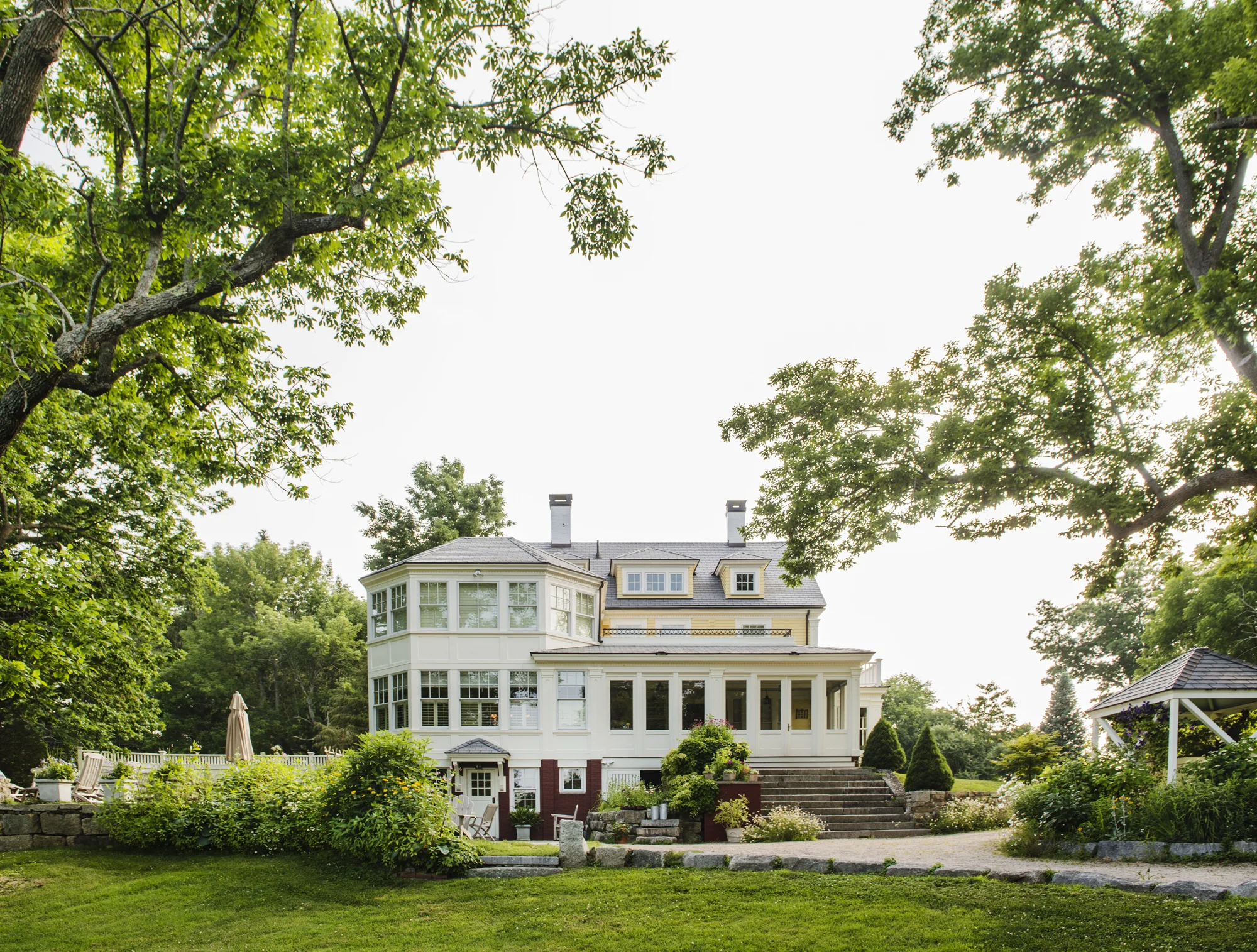 Mead Meadow Main House and Patio A special heartfelt thanks to Angela Olsen Matthews and her husband, Peter Matthews, at Mead Meadow for their thoughtful and gracious generosity and hard work in hosting our scrumptious and serene summer picnic. You can visit Angela’s Instagram page @ MeadMeadow About Mead Meadow We were invited to historic Mead Meadow, in picturesque Kittery Maine, to shoot our delightful summer outdoor meal. This water front paradise is a restored 140 year old farmstead, originally a 20 acre estate, was called Mead Summer House. Included: the main house, a horse and buggy carriage house, which is now a guest cottage, a boat house and the original well. The lovingly restored buildings are now nestled on 4 acres of manicured grass surrounded by wild and cultivated flowers, raspberry bush stands, shrubbery and original trees. The garden shed was torn down and its beautifully weathered old New England stones have been transformed into a spacious patio surrounded by potted herbs and flourishing flowers, with a bucolic view of the rear grounds and cove.