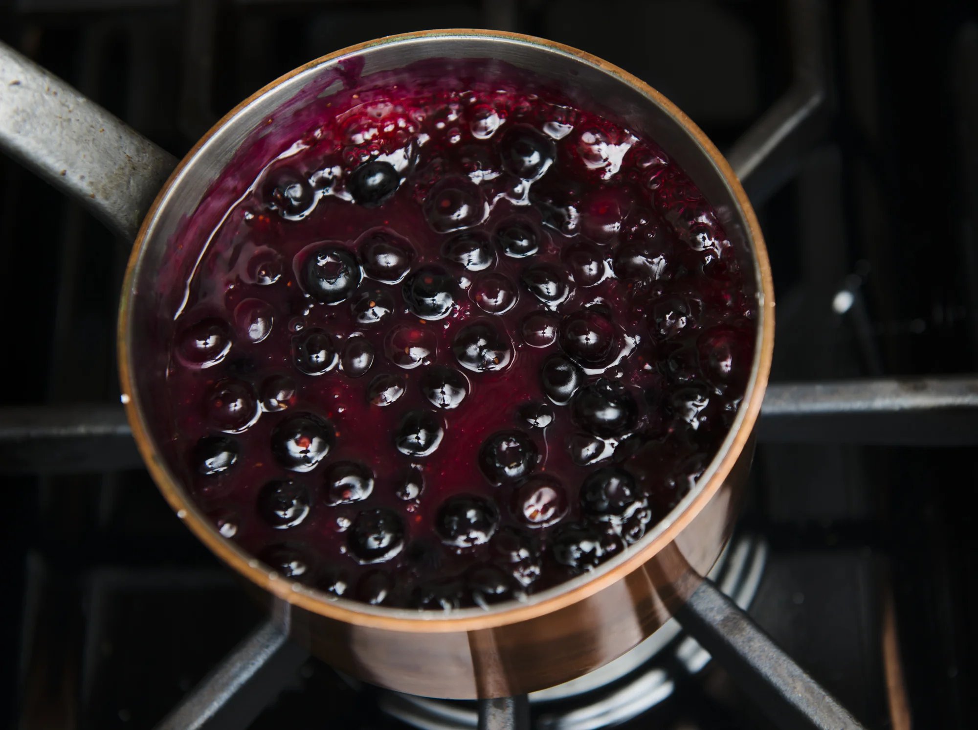 Directions Making the Sauce 1. Place the sugar, lemon juice, cornstarch, salt and water in a medium size saucepan on low heat and stir until the sugar is dissolved. 2. Stir in the blueberries and raise the heat to medium. 3. Bring the mixture to a boil and cook until the some of the berries have started to burst and the juices have thickened, about 5 minutes. Most of the blueberries will break down but others will still remain whole. ( To make distinct outer blueberry swirls, drain some of the blueberry liquid and place it in a small squeeze bottle with a little hole in the tip. Sparingly, make thin graceful lines of blueberry sauce before and after filling the popsicle molds .) 4. Set aside and make the ice cream base, allowing the sauces to cool to room temperature.