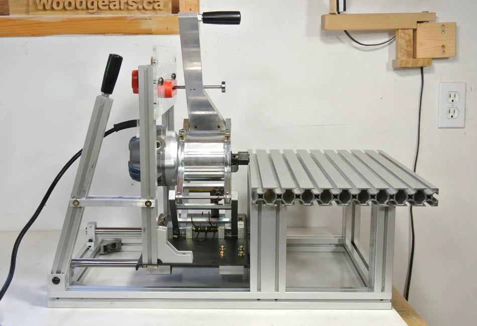 Mount the table. The table is slid from the side. Make sure the washers go inside the channels.