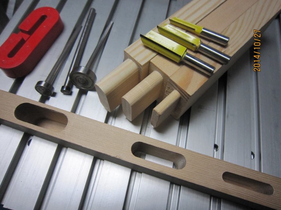 Three different size mortise and tenons were all made using the same template. Changing the bit diameter and guide bearing size adjusts the size from 1/4" to 3/8" to 1/2".