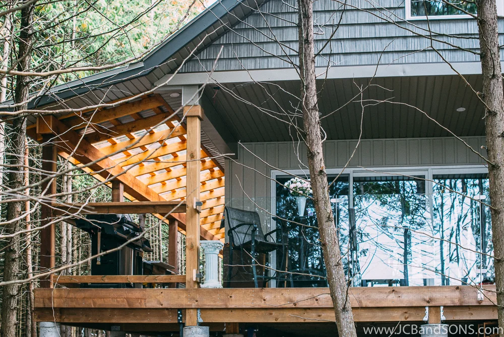 We installed 2"x4" rails with a 2"x6" handrail which received a nice big round over to create the railings for the porch. The homeowner has plans for his own spindles and is looking after that himself.