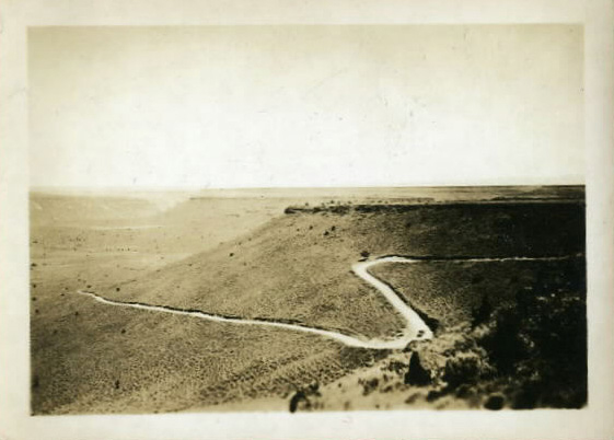  Winding road snaking through the American West. c. 1920
