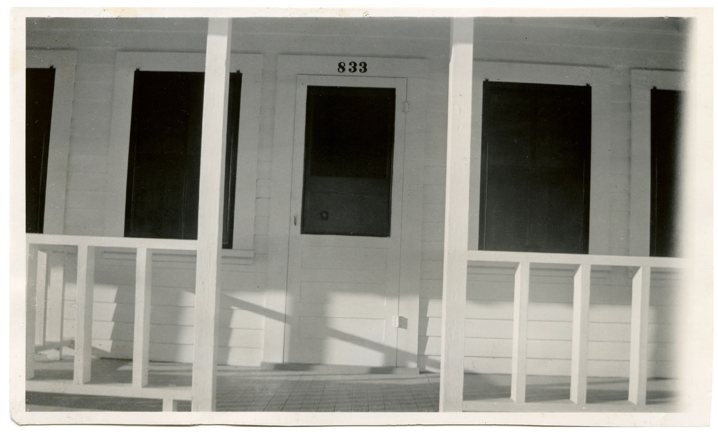  This white and black composition of a what appears to be a freshly painted front porch reminds me of the work of the great American photographer Walker Evans (1903 - 1975).