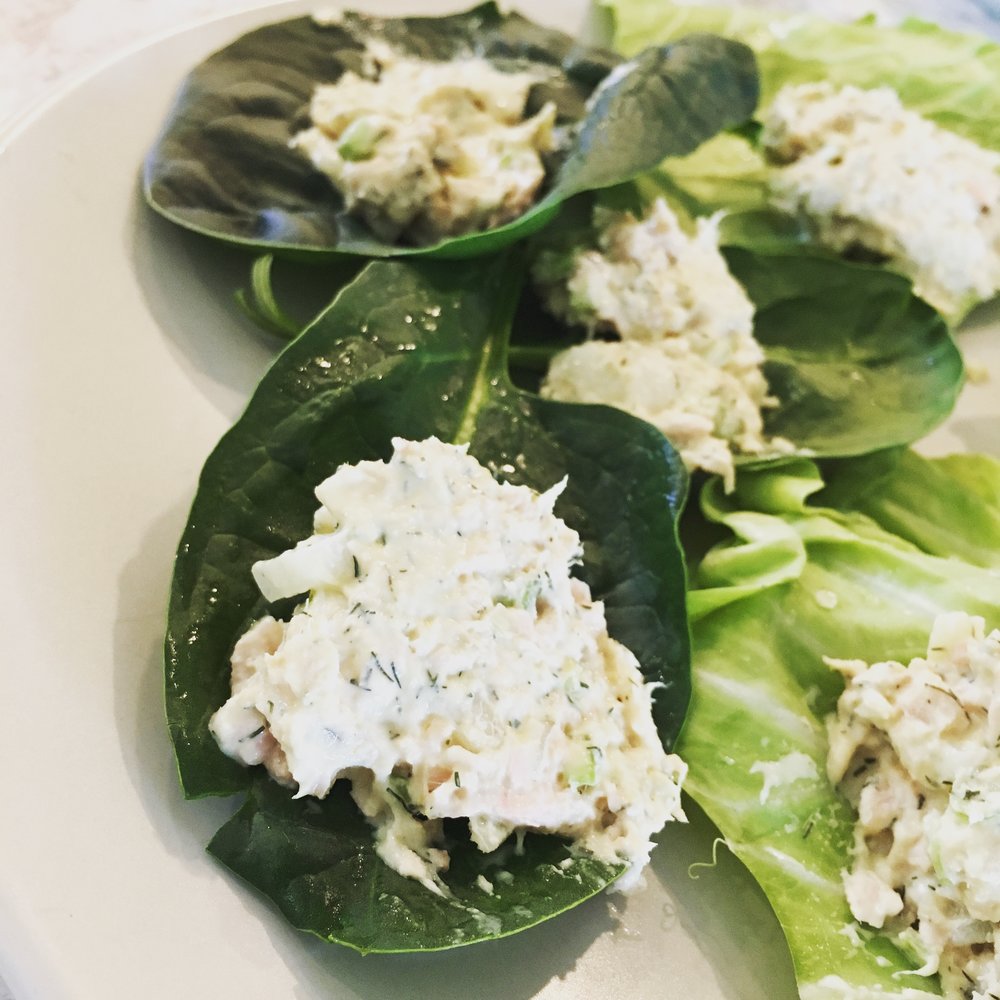 tuna salad on giant spinach leaves