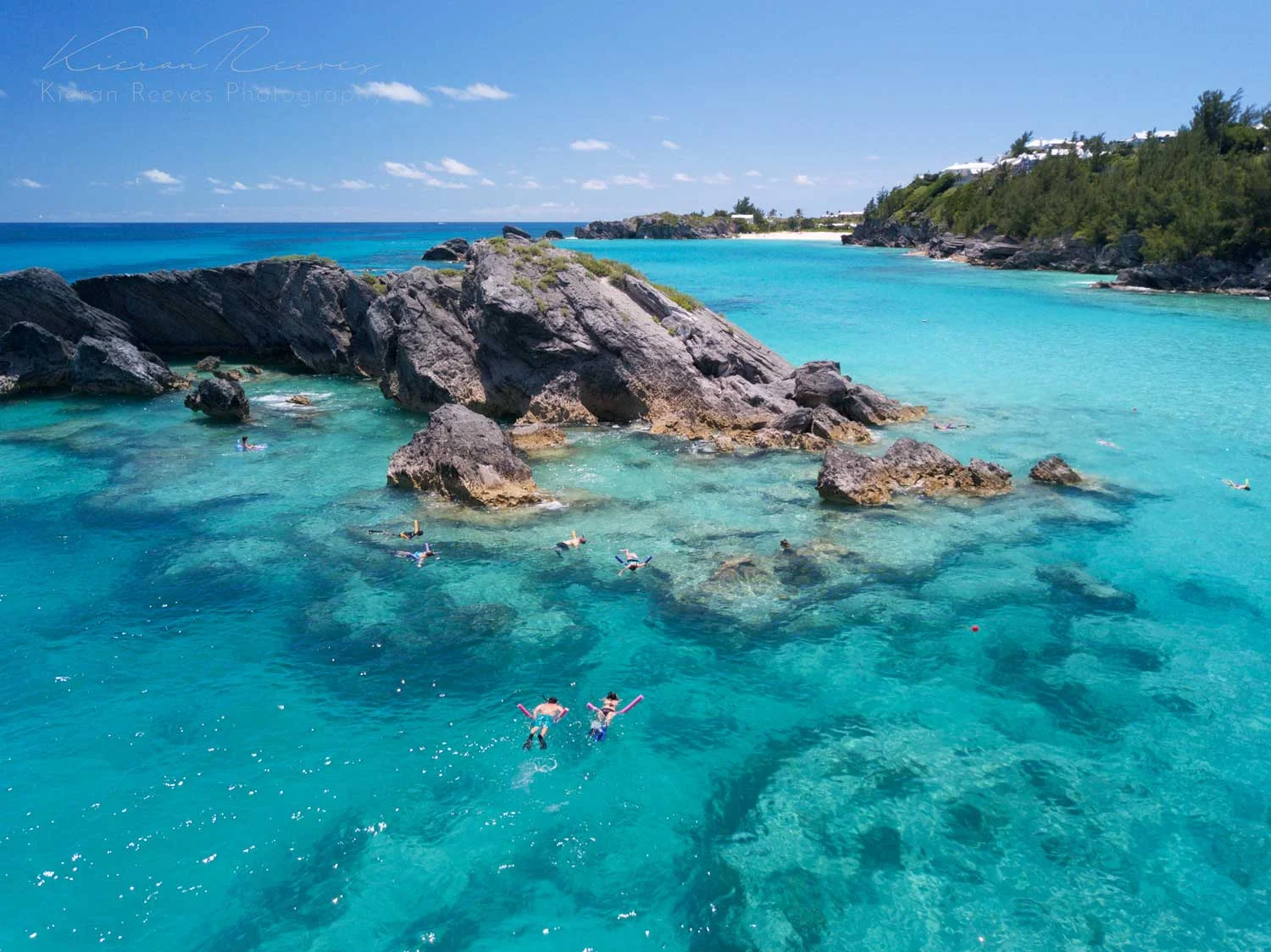 Snorkelers exploring the area right near the sunken canons! 