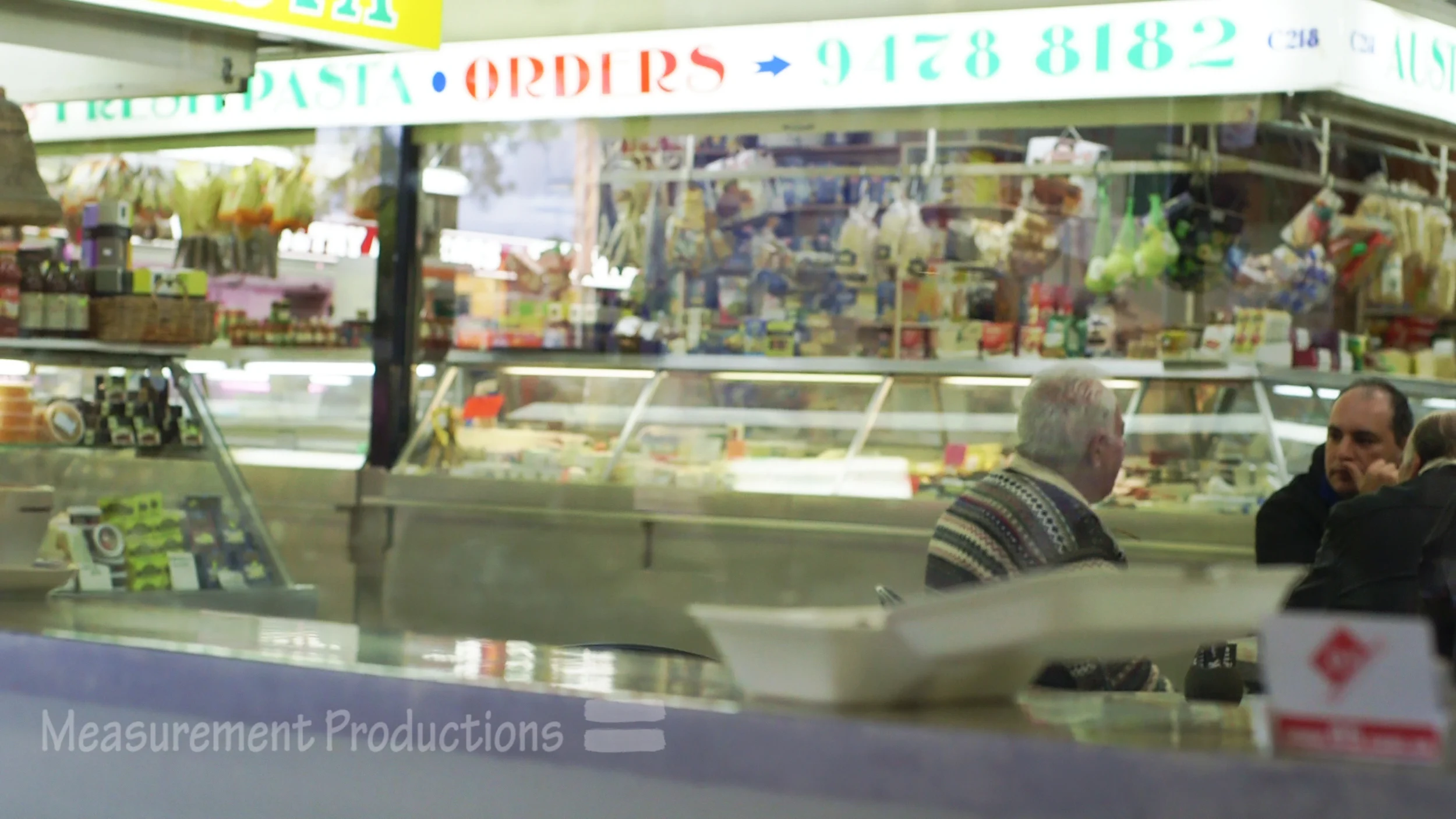 guys sitting in preston deli.jpg
