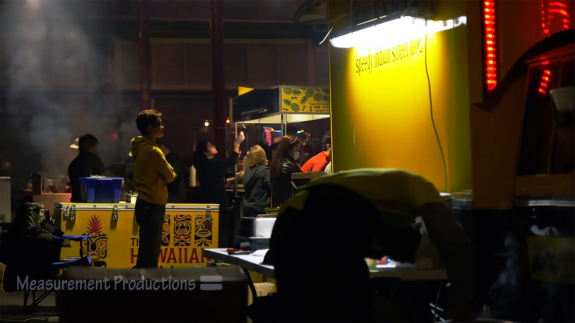 nightmarket person standing up.jpg
