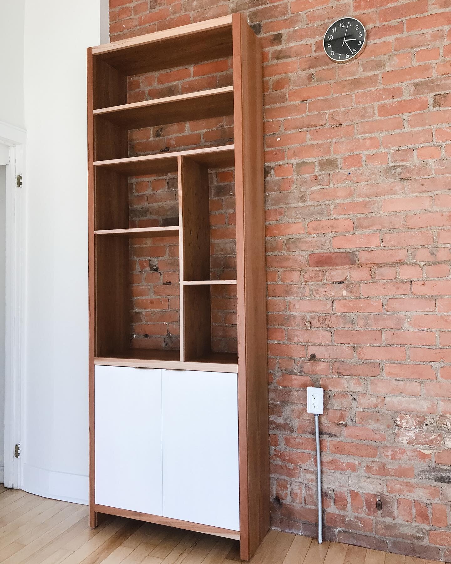 Very happy to have delivered our asymmetrical shelving unit to its new home at @strutsalon

This piece features cherry construction and white enclosed storage below.

This style can be fully customized to suit your space with a custom order. You can 