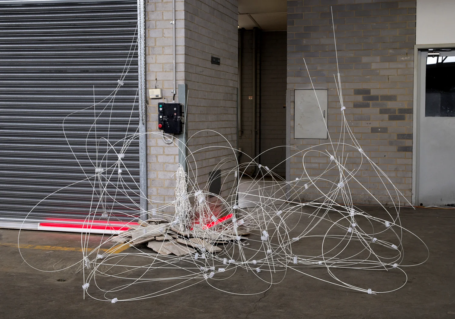 not an endless bounty , 2017. NotFair, Windsor. Fibreglass poles, sandstone, rope, light. Dimensions variable. Photo: Theresa Harrison.