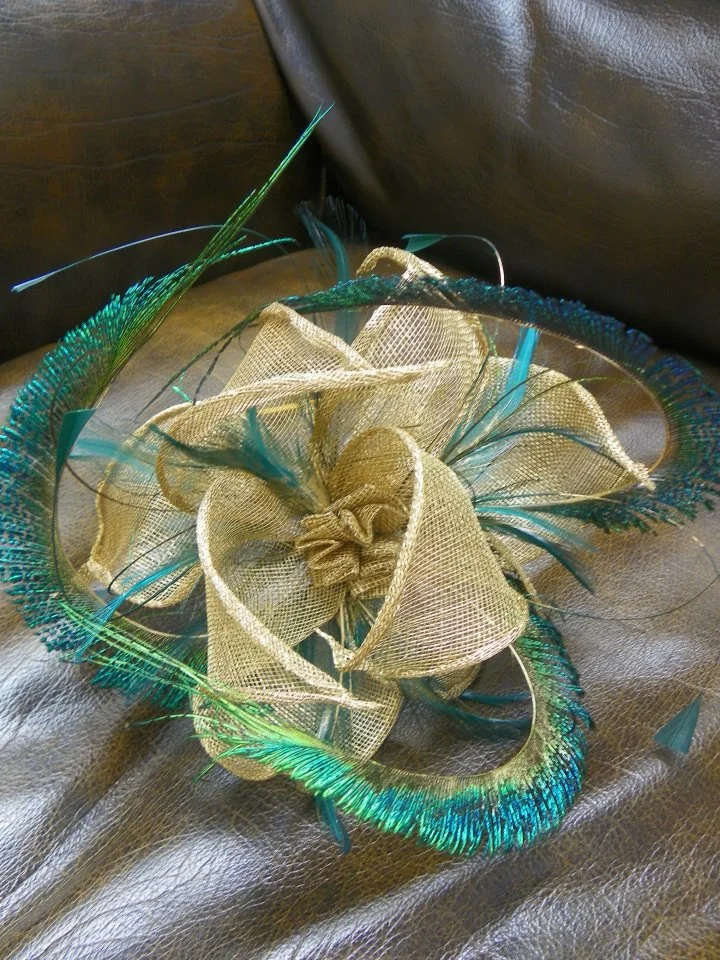 Sinamay petals with peacock sword feathers
