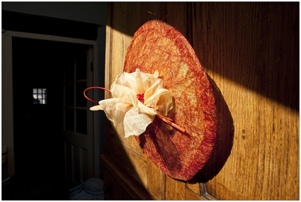 Large oval saucer hat with handmade poppy