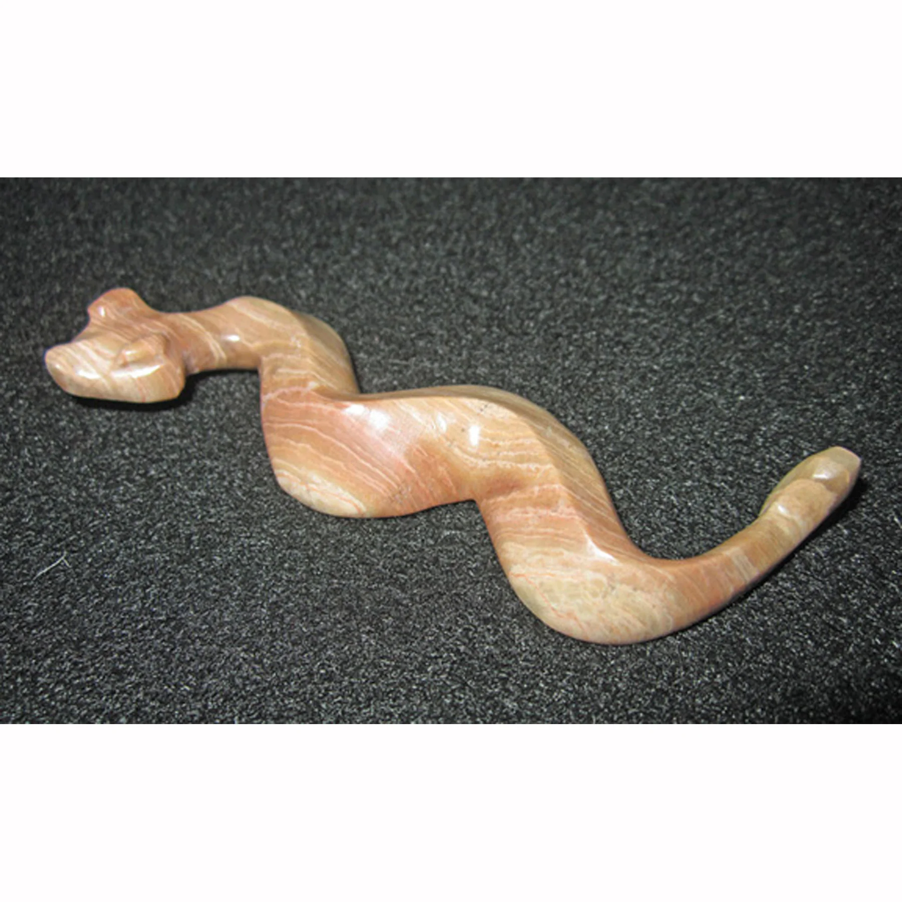 R820L-Square-Melvin-Sandoval-San-Felipe-serpent-carving-1200.jpg