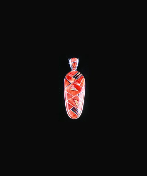 Native American jewelry Navajo Calvin Begay red cartouche pendant. 2" x 3/4" #MW65