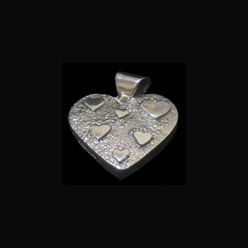 MZ63V_Calvin_Begay_Navajo_reversible_heart_pendant-500.jpg