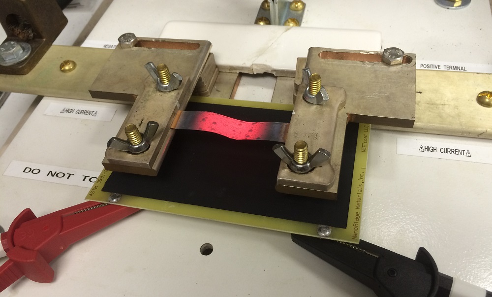 A strip of TeraCopper undergoing an ampacity test. TeraCopper can withstand 40% more current than ordinary copper before deteriorating. 