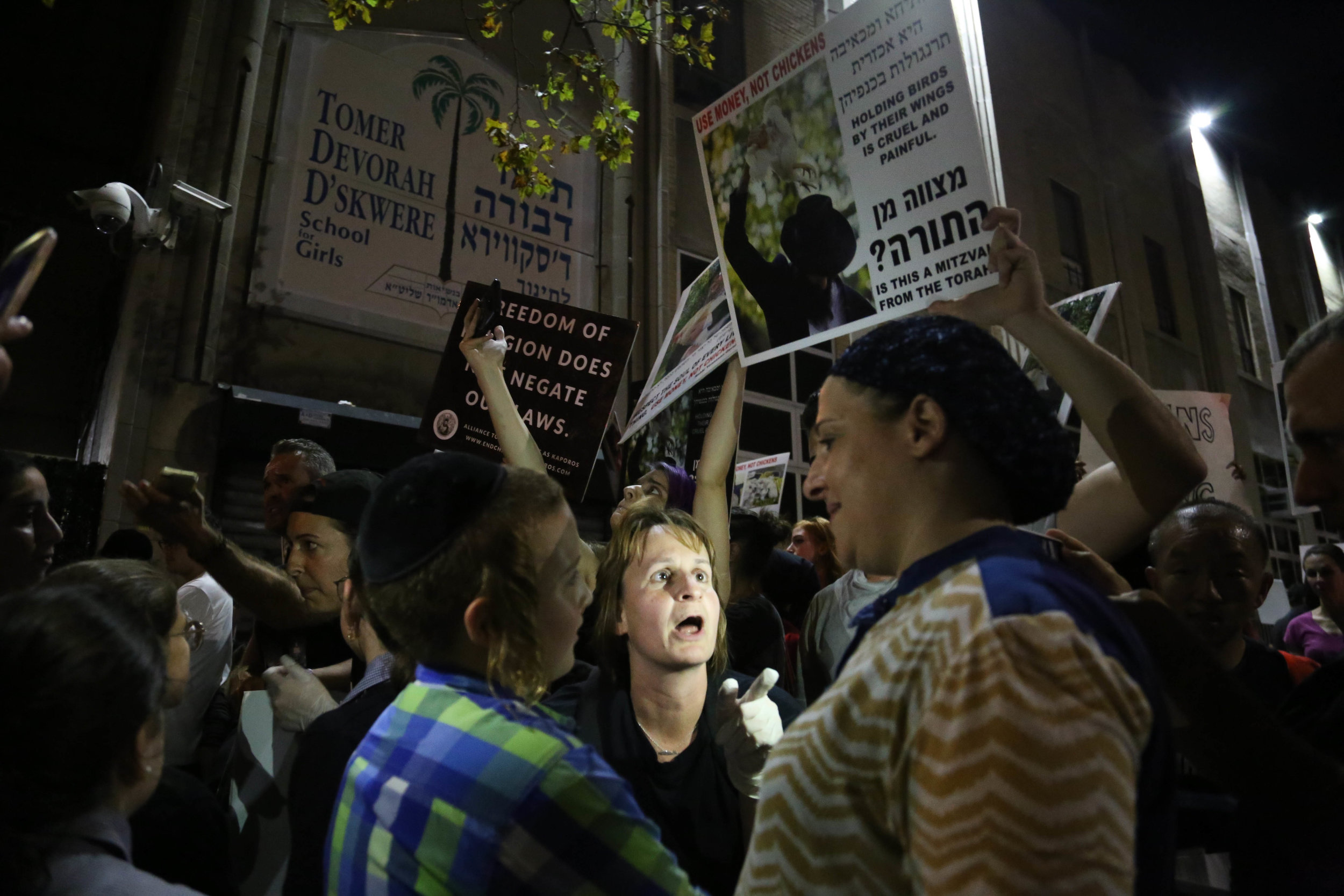 As the only truly neutral person there, a lot of people eventually wanted to talk, though few wanted to be on camera, even if I was the one taking the photo. One woman told me, "When I tell them I don't want to be on camera, they tell me it'