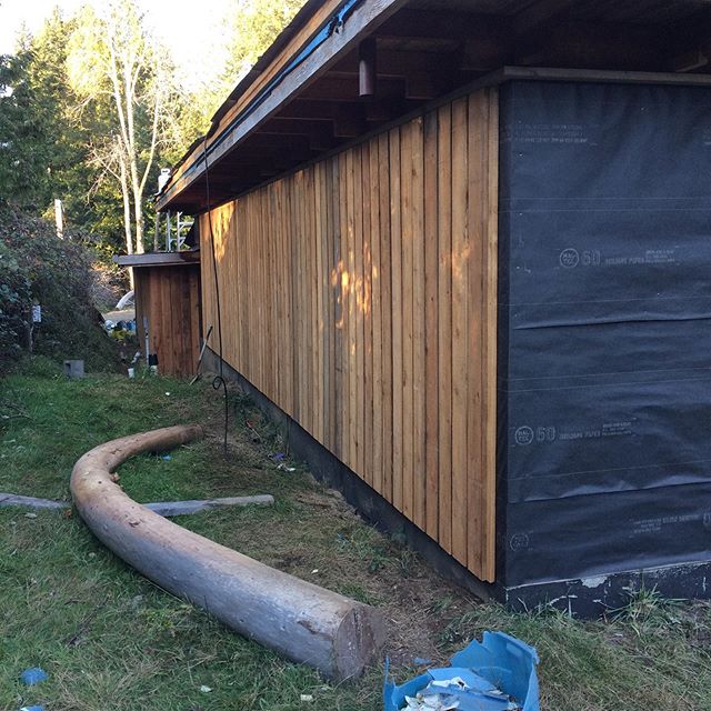 Backside of shop and garage siding done in cedar, board-over baton. #siding #redceadar #getterdone #winterbuilding
