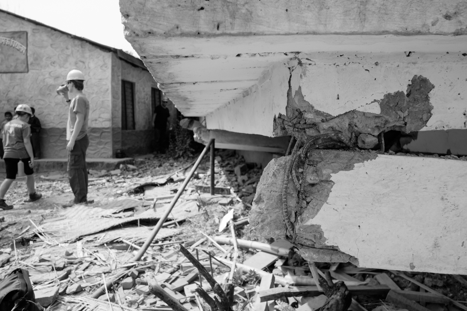 The second floor of the school entirely shifted and crushed the first floor. Luckily the earthquake happened on a Saturday when kids don't have class.