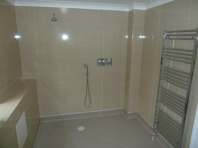 FLat 9 ensuite complete bath and tiling.jpg