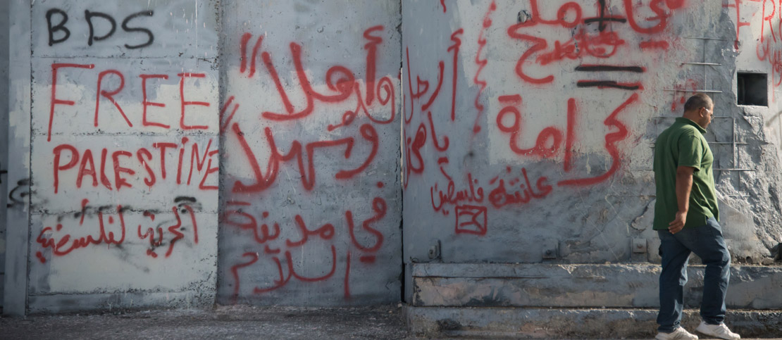 Graffitti on the separation wall in Bethlehem, by Ryan Rodrick Beiler/Activestills.org