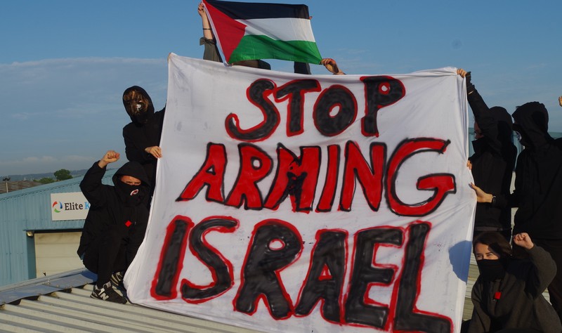 Photo given out by activists shows protest on the roof of Elite KL, an Elbit-owned factory in Staffordshire, UK.