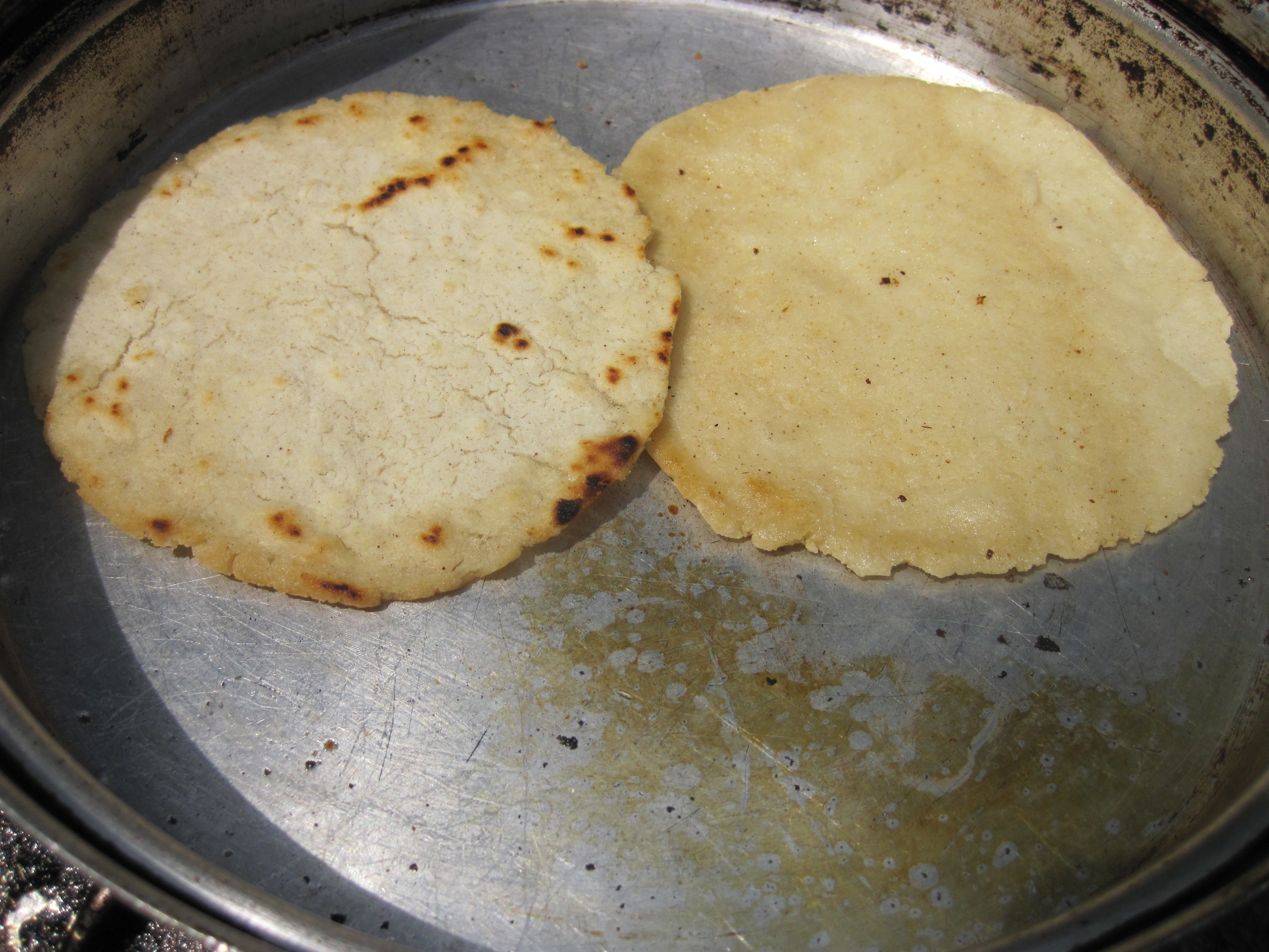 Fresh tortillas cooking on the camp stove. 