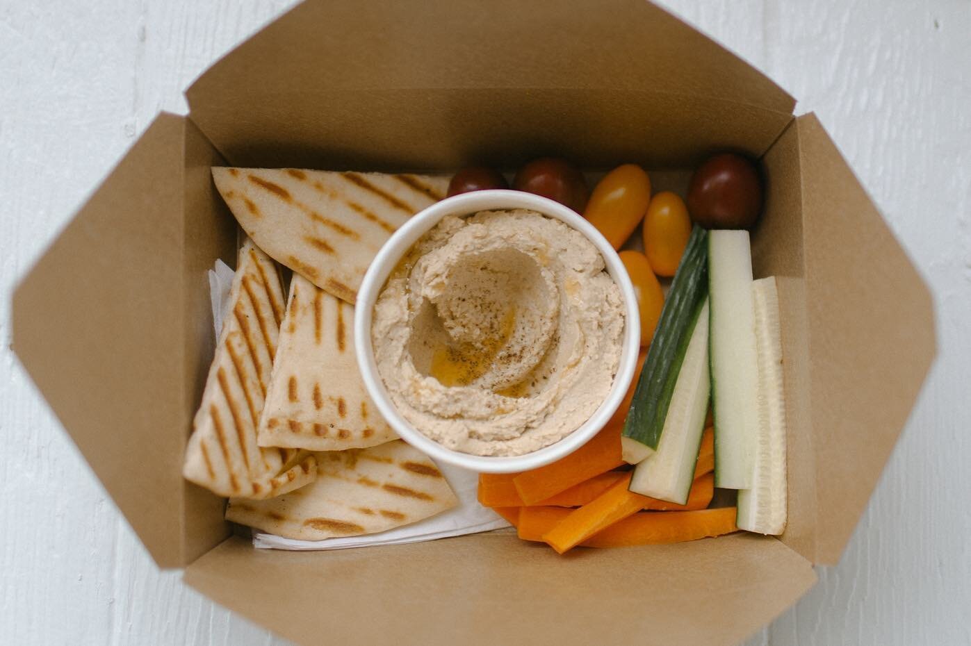 Hummus-to-go. Order online or pick up in the shop!