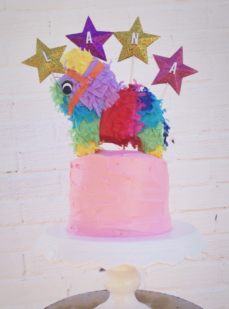 For Lana's 1st birthday fiesta, I created these sparkling stars and we purchased the mini-piñata as the final statement piece.