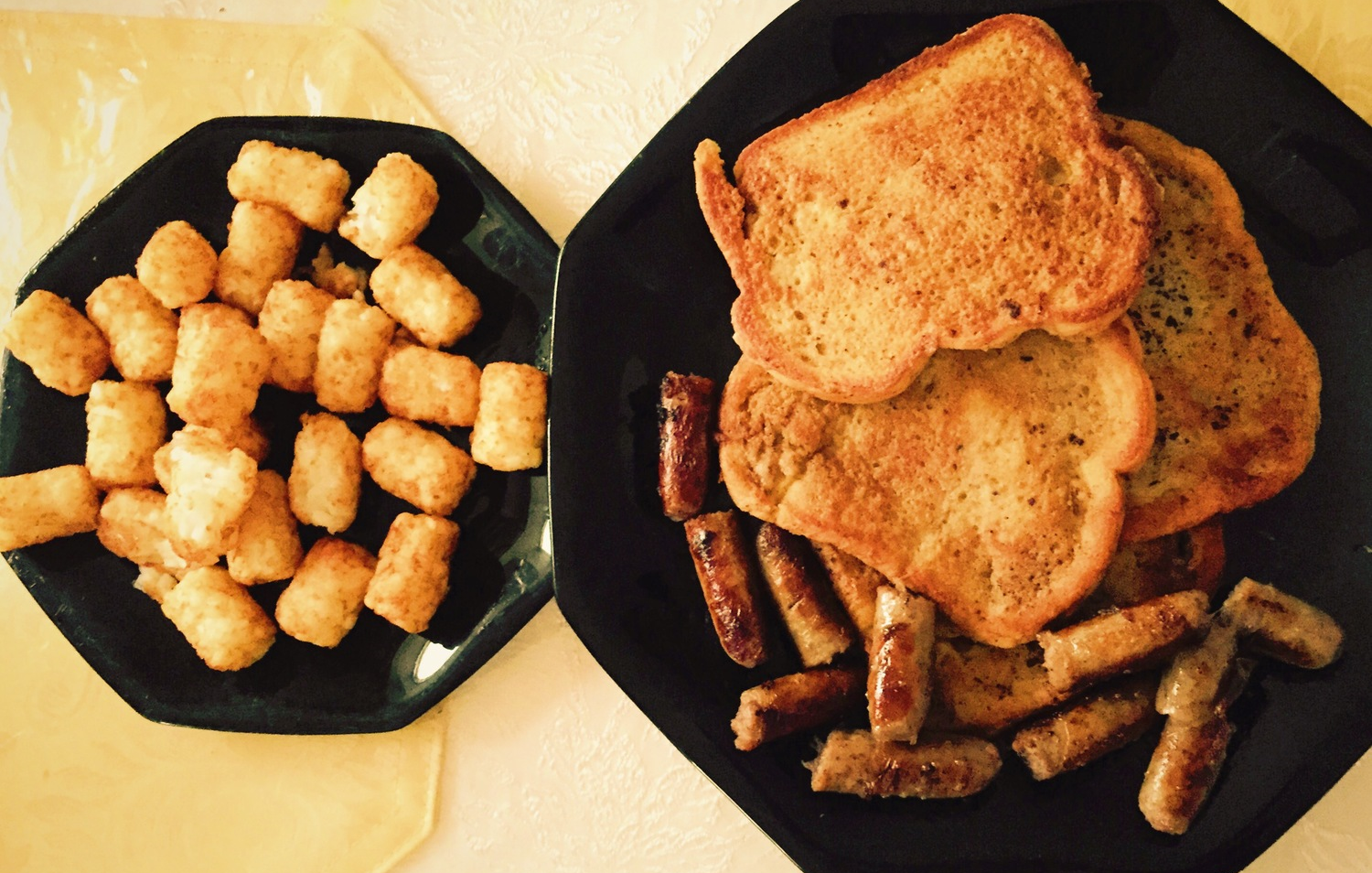 Cinnamon Vanilla French Toast w/ sausages and tater tots