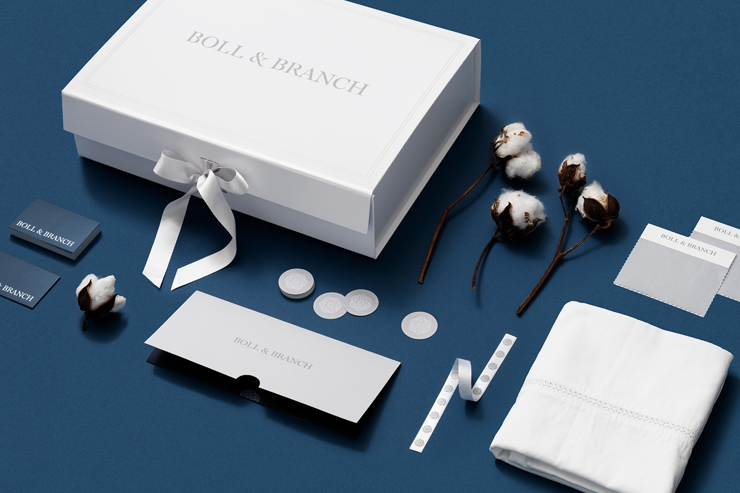 Utilizing a neutral color palette that complements the Boll & Branch product assortment, various grays help create depth in the brand experience; a strong navy hue helps to ground assets.