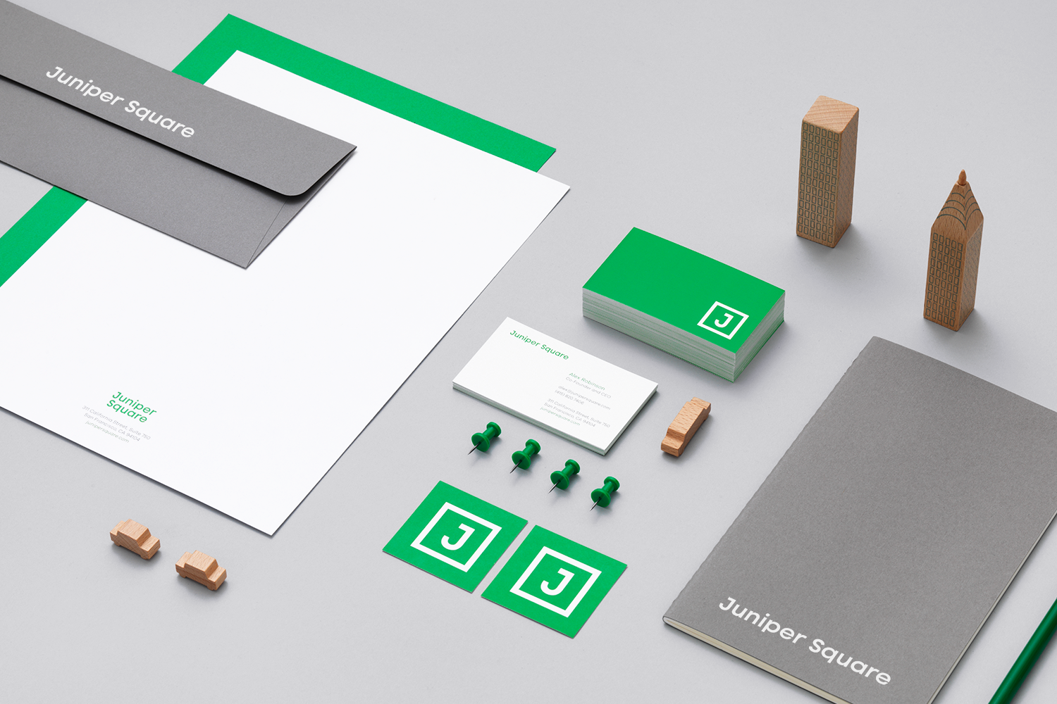 With a bright primary hue, Juniper Square stands out from market competitors; grays help to ground the vibrant green.