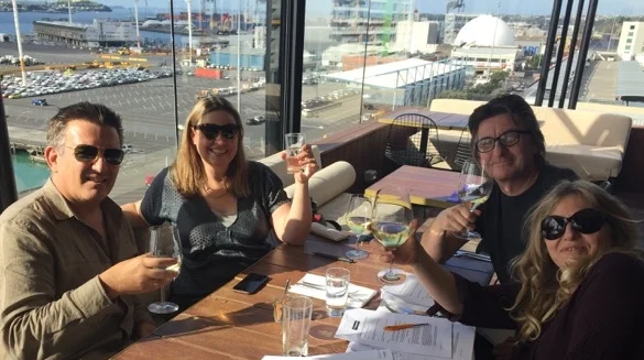 Jan Hellriegel and Wayne Bell signing contracts and congratulating the producers of Filthy Rich