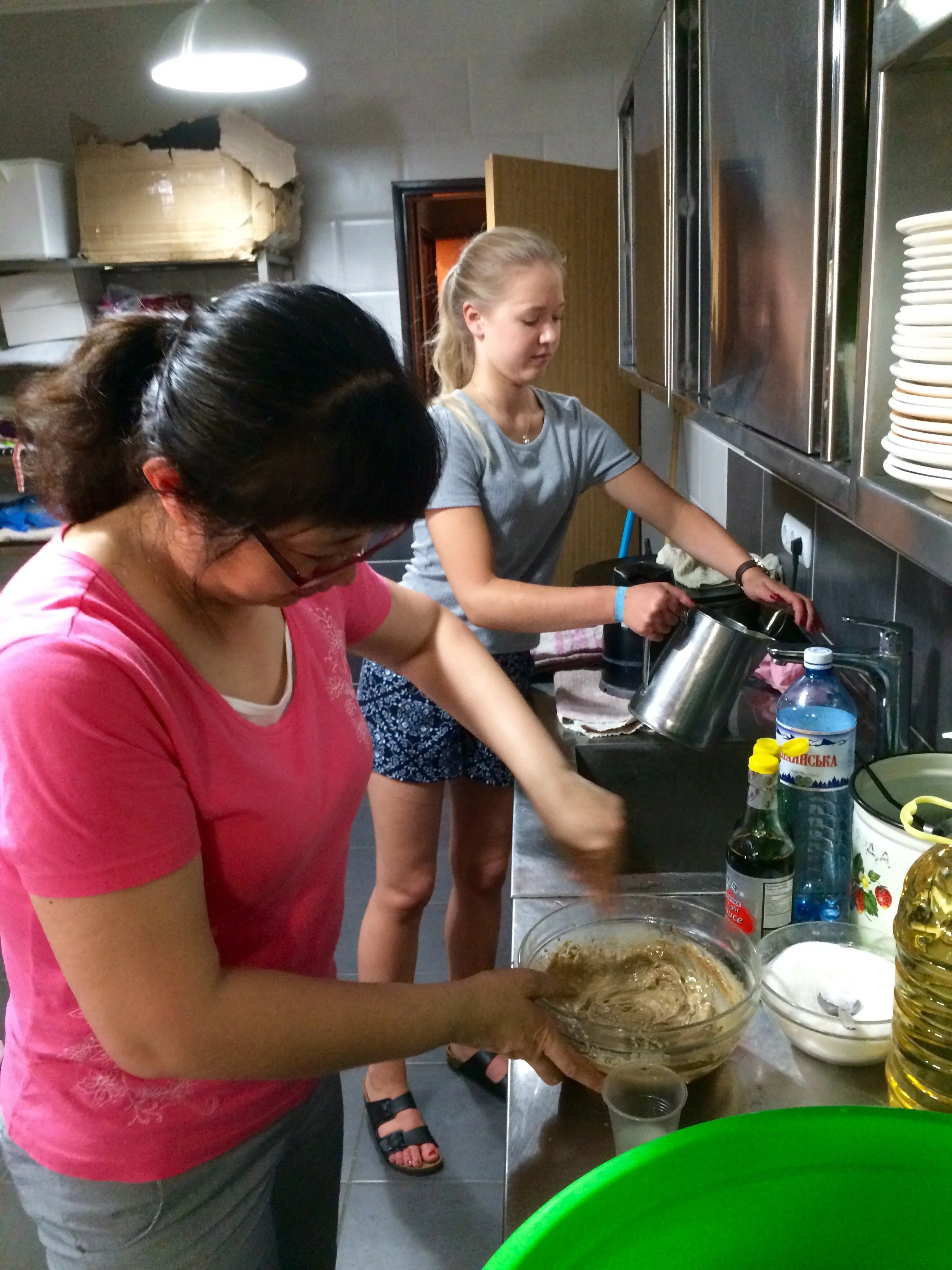 Lily is mixing the sesame seed dressing.