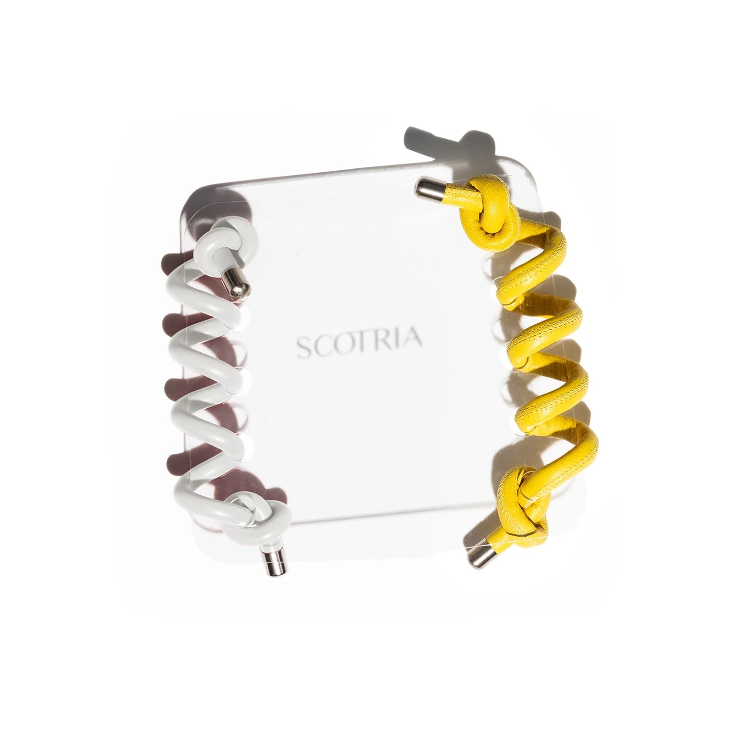 Spiral 1 Colour: Transparent Silicone. Spiral 2 Colour: Yellow Leather.