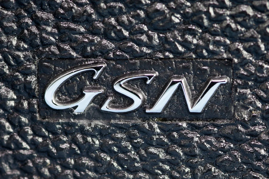 The GSN has a chrome covered body, whereas the similar GTN has a black body