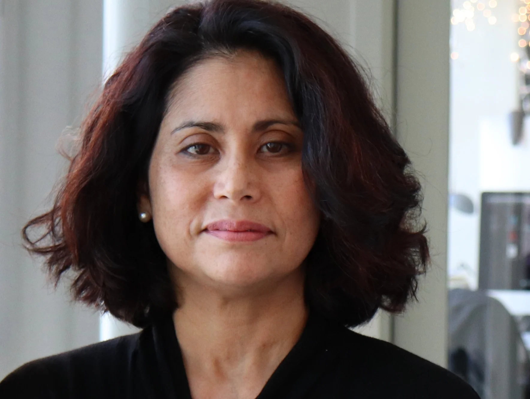 Lily Robles, Partner and Creative Director specializing in branding at Opus Design