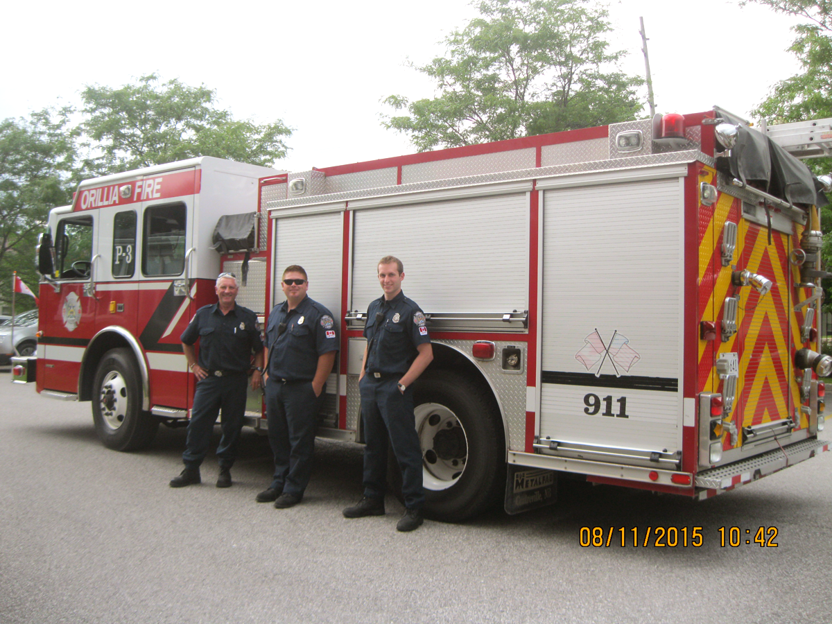 Firefighters and fire truck visiting