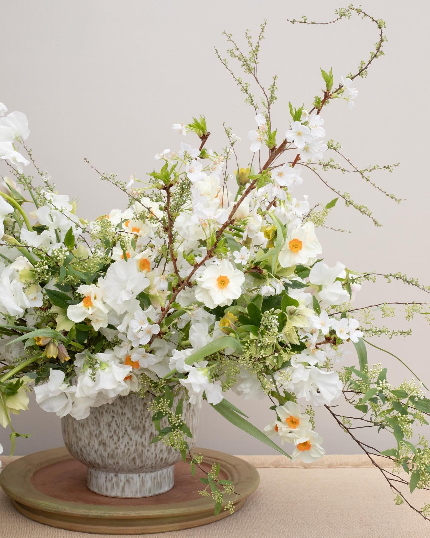 Perfect geranium daffodils, fritillaries, sweet peas and spirea in a fun new vessel. I love spring flowers!