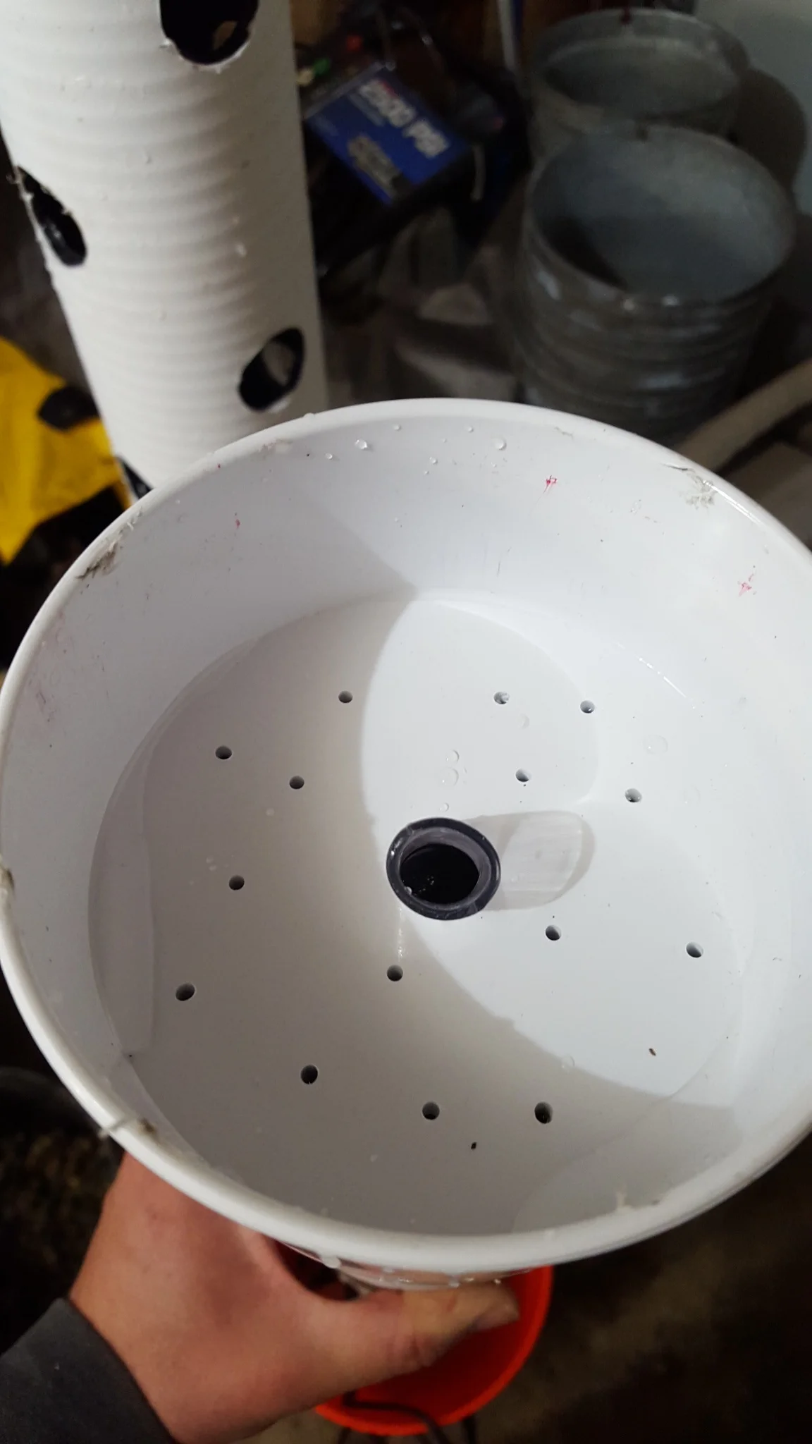Drainage holes for the water system.