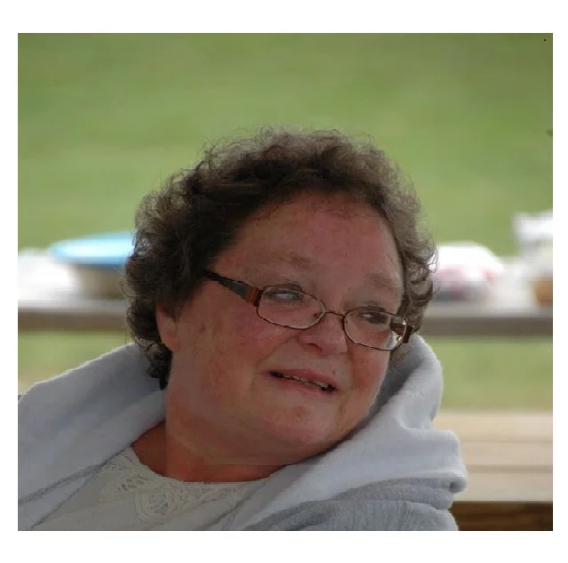 Momma Wells in her stylish "E" zip up hoodie!