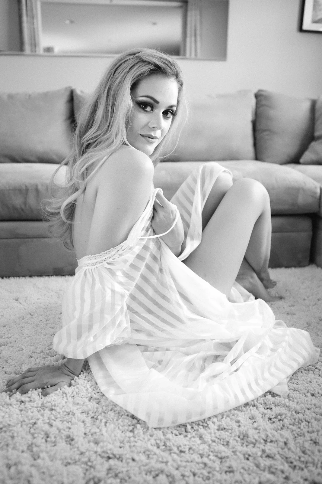 "My favorite part was the effect before and after the shoot. Before the shoot I started exercising more, taking care of my skin and hair, thinking about what I wanted to look like as a sexy model. After the shoot I felt sexier than ever, kept talking care of myself and I knew for a fact I was sexy because I had seen the pictures and it was proof! It brought me out of a funk I had been in for a couple years and motivated me to be who I really want, it was the exact kick in the pants I needed. You can either spend the money on a shrink, or sexy photos."