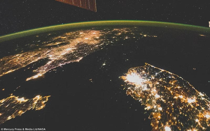 North Korea is the dark space between China and South Korea. Image taken by the International Space Station. Photo Credit: Mercury Press/NASA